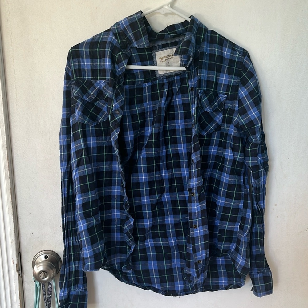 A blue green and black flannel